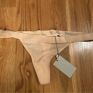 NWT Negative Underwear Peach Sieve Thong